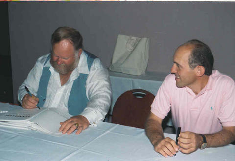 Armin and Ritch signing autographs